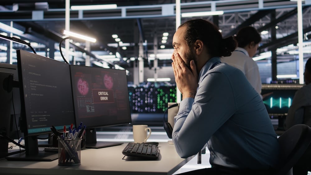 frustrated IT tech because working with outdated technology