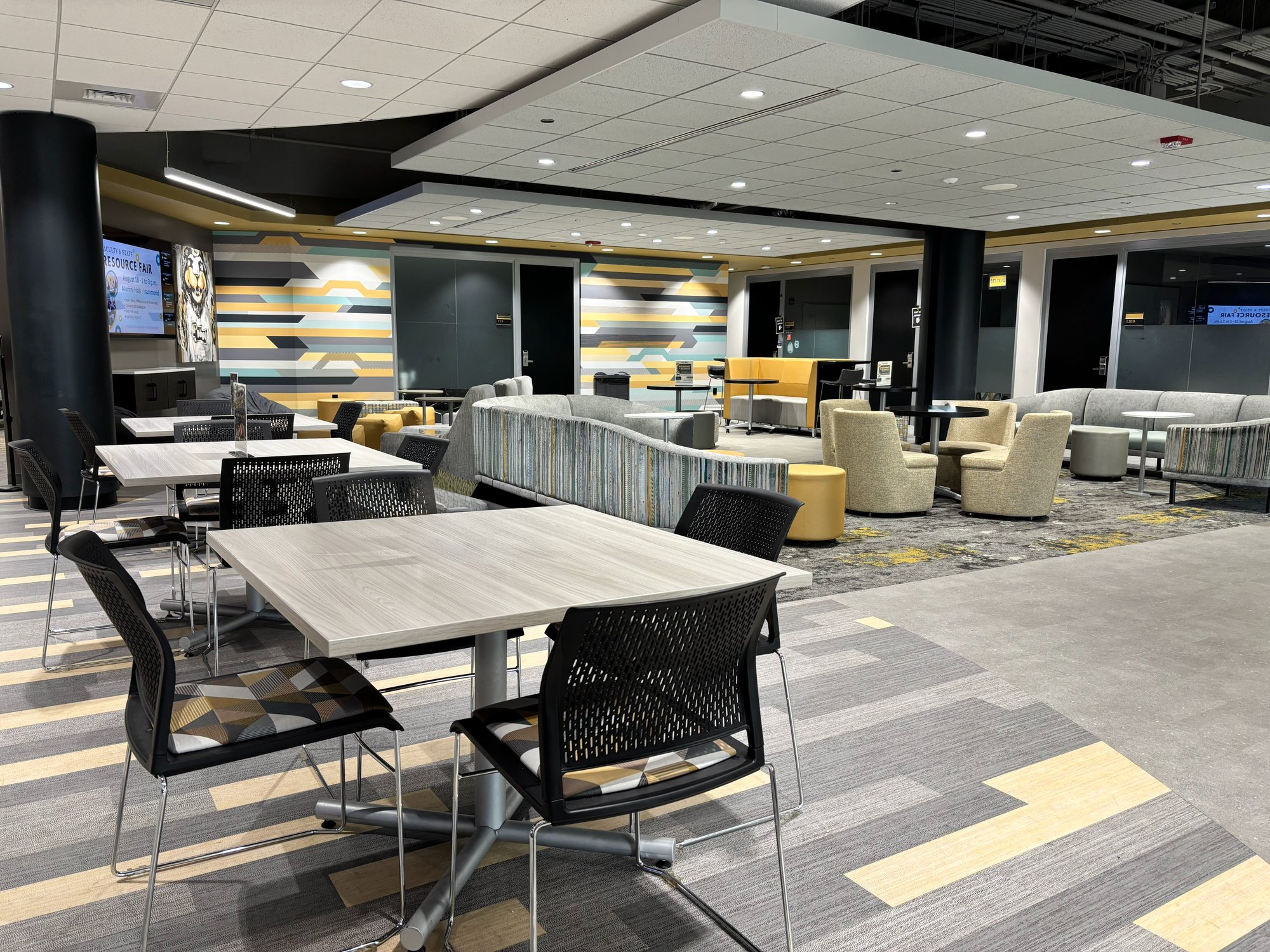 PNW Lobby with tables, couches, and various soft seating options in gold, silver, and black PNW Lobby with tables, couches, and various soft seating options in gold, silver, and black