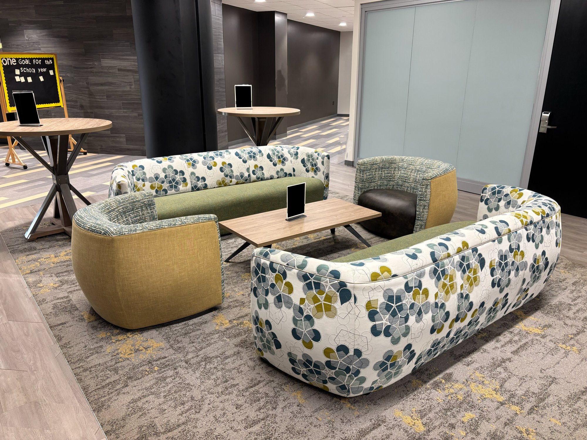 Round couches and chairs around a table Round couches and chairs around a table