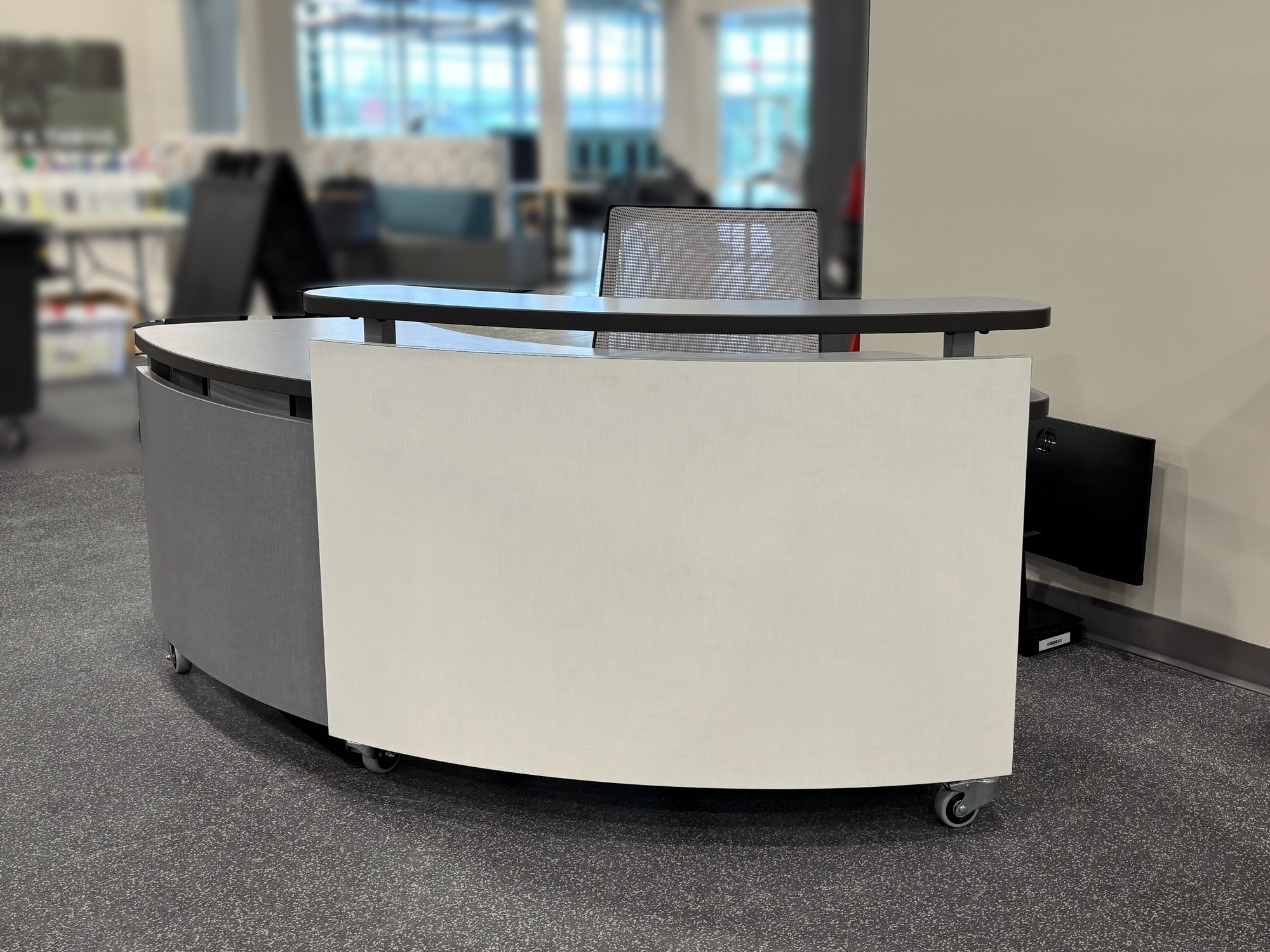 Mini rolling desk in the weight room Mini rolling desk in the weight room