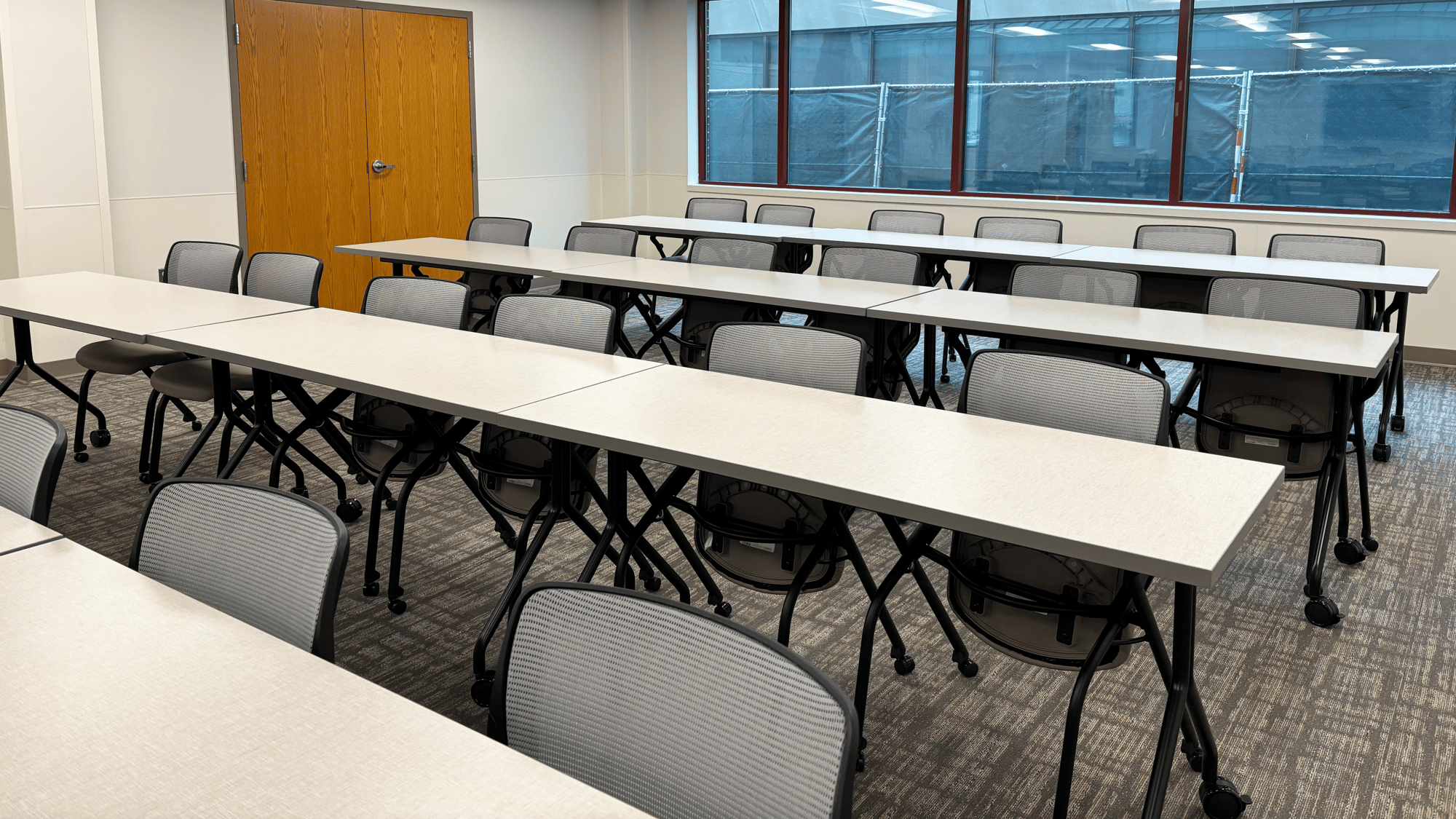 Rows of rolling tables and chairs Rows of rolling tables and chairs