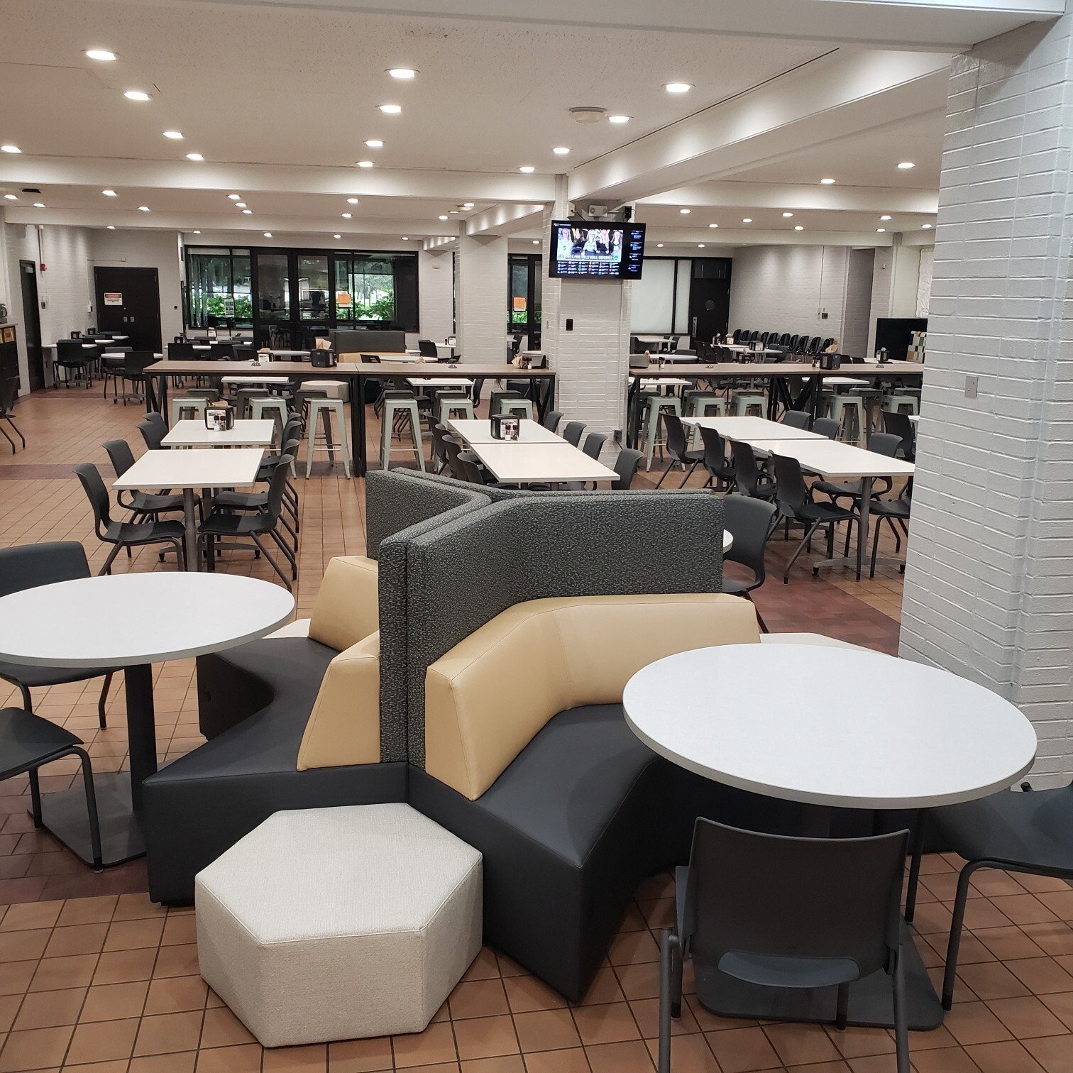 Corner couches and multiple tables Corner couches and multiple tables