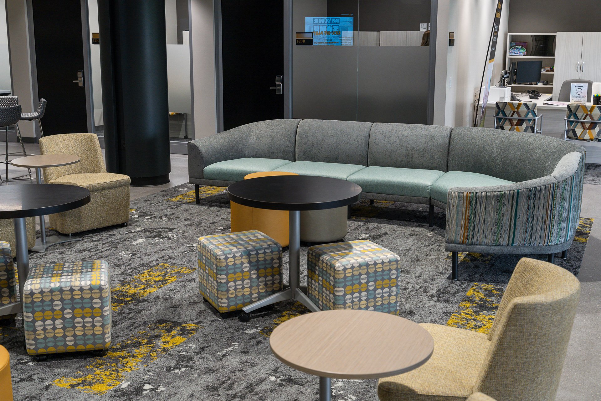 Gold, grey, and steel blue seating Gold, grey, and steel blue seating