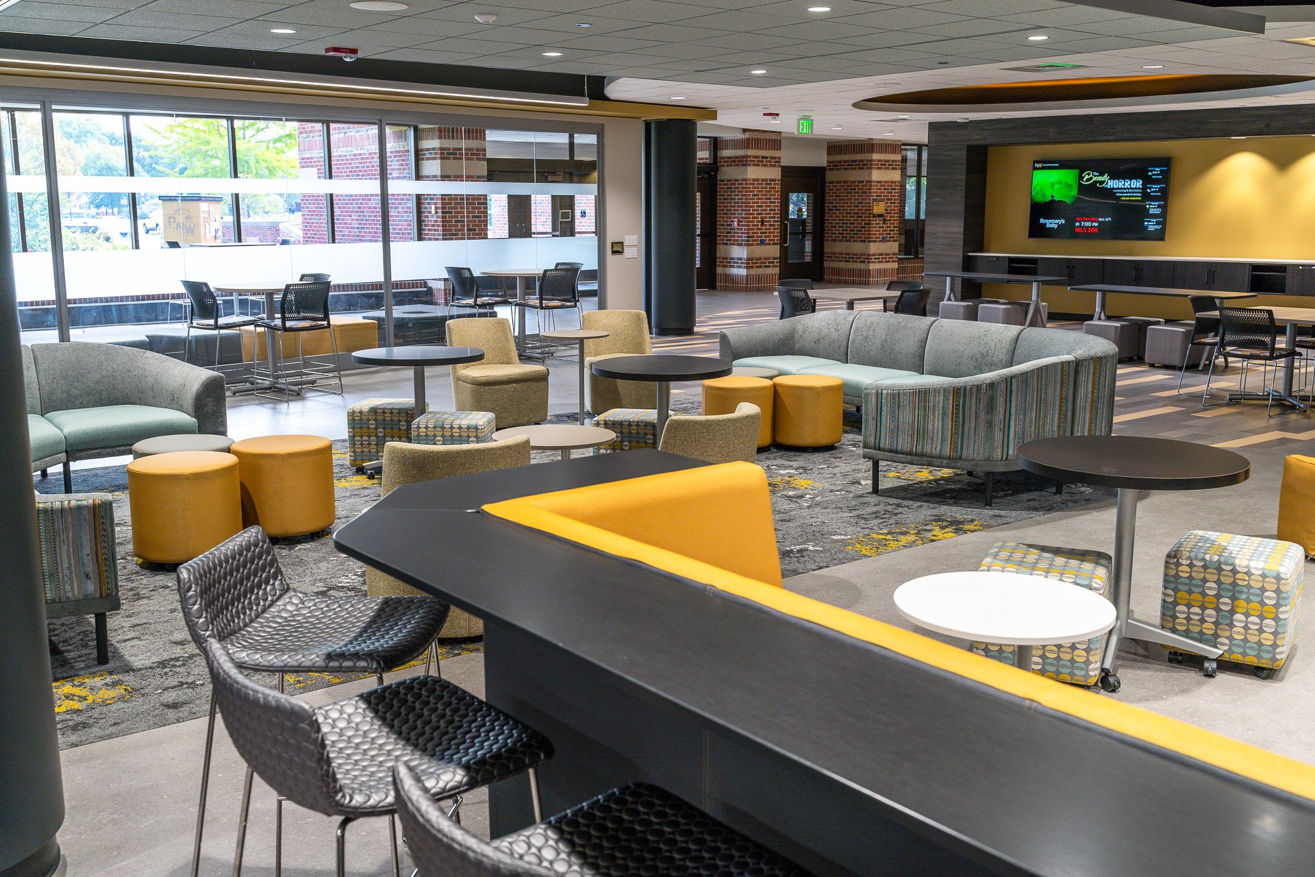 Large seating areas in various shades of black and gold. Large seating areas in various shades of black and gold.