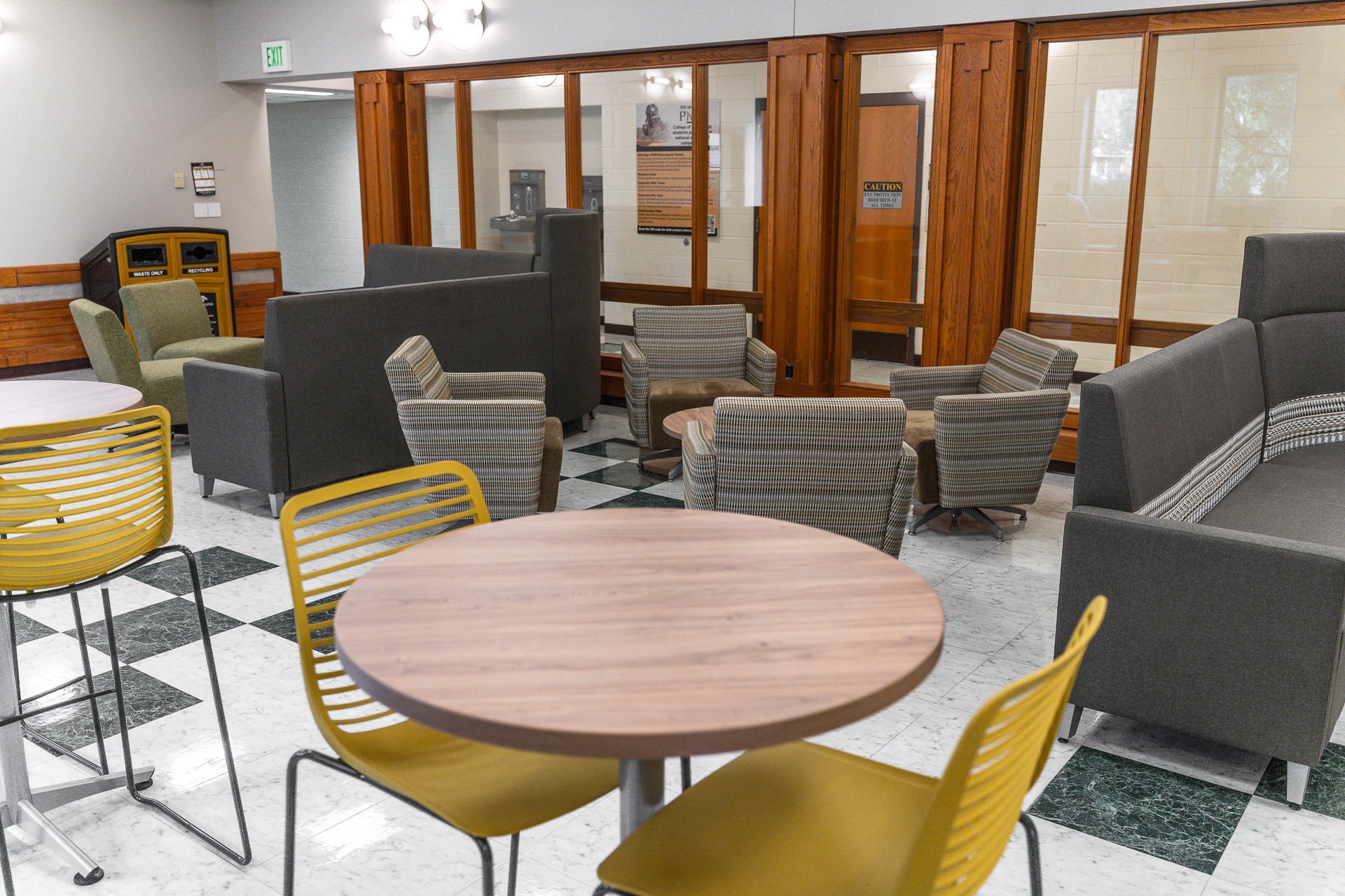 Gold and grey seating takes up area Gold and grey seating takes up area